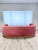 MODSHOP Germain soft curved sofa with channel back tufting; Gold edge base. Fabric: Robert Allen cotton velvet CORAL