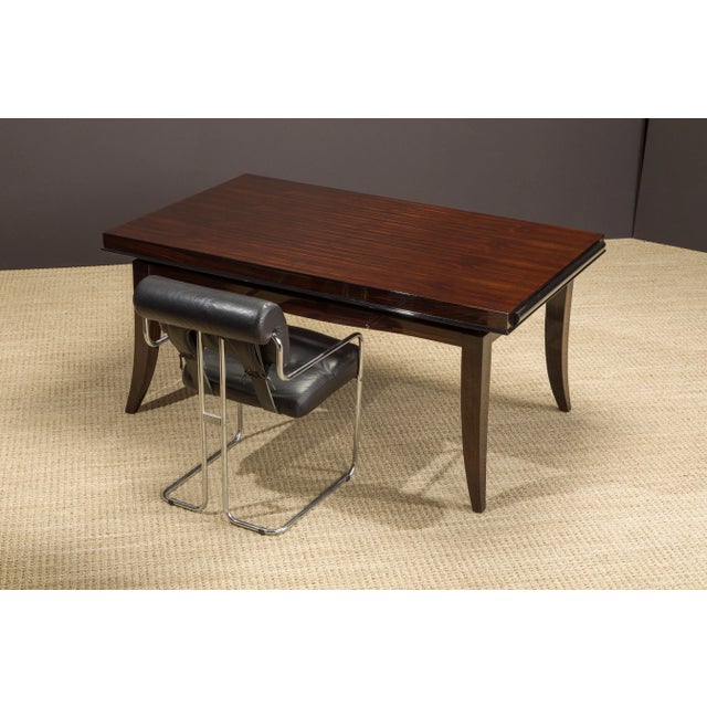 This gorgeous French Art Deco dining table in exotic Macassar Ebony wood, which would also work beautifully as a desk, was...