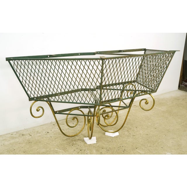 French style console table base made of wrought iron, painted green and gold. The base can be attached to the wall for...