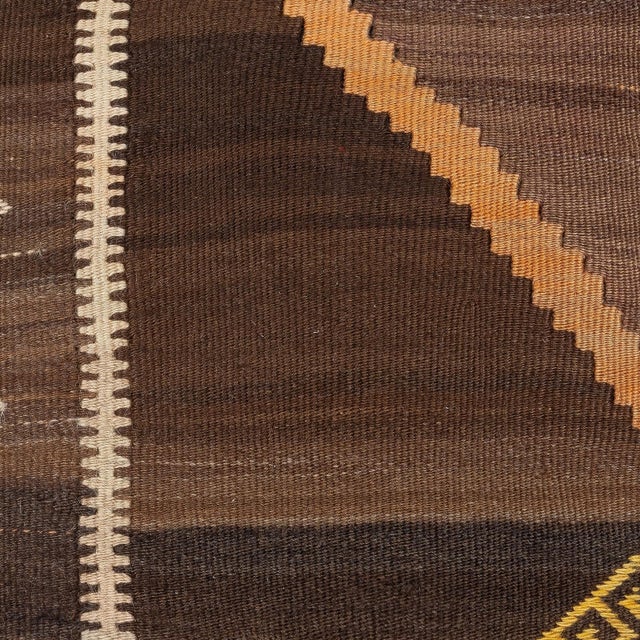 Add a touch of history and warmth to your space with this vintage handmade Turkish wool kilim cushion cover. Crafted from...