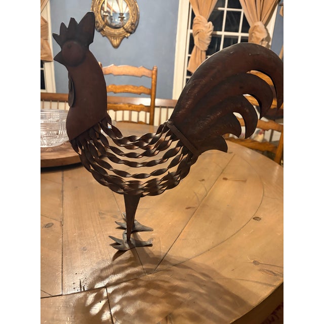 A wonderfully expressive vintage handcrafted fabricated metal rooster sculpture featuring rustic folk-art character and...