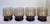 These vintage smoky brown lowball rocks glasses feature a clean, sculptural silhouette that feels distinctly Mid-Century...