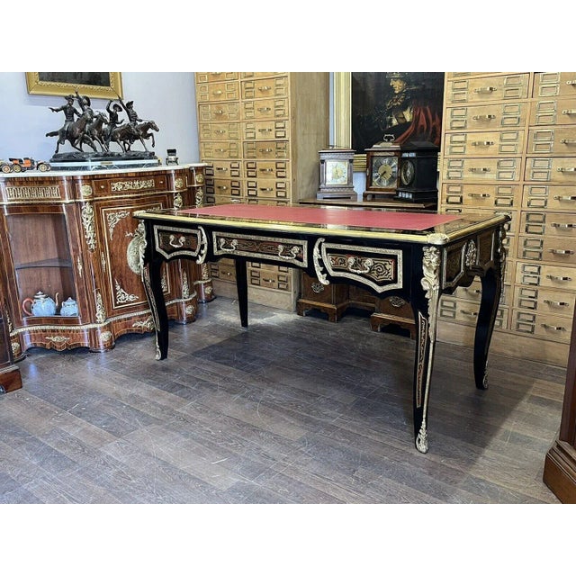 Large Desk with Boulle And Brass Decoration All drawers run smoothly. Looks beautiful front back and sides. Strong and...