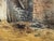 Original watercolor on paper attributed to Frank Henry Mason, depicting a rustic village courtyard with weathered stucco...