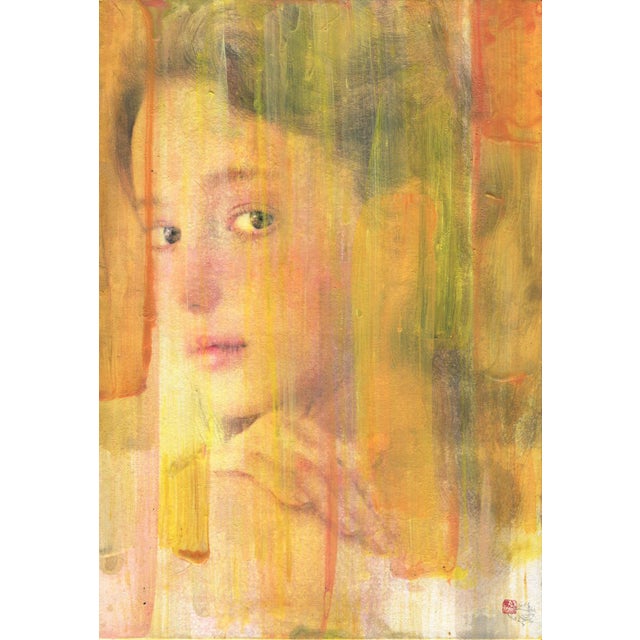 In "Blind Portrait V," soft hues of yellow and orange wash over the delicate features of a figure, creating a dreamlike...