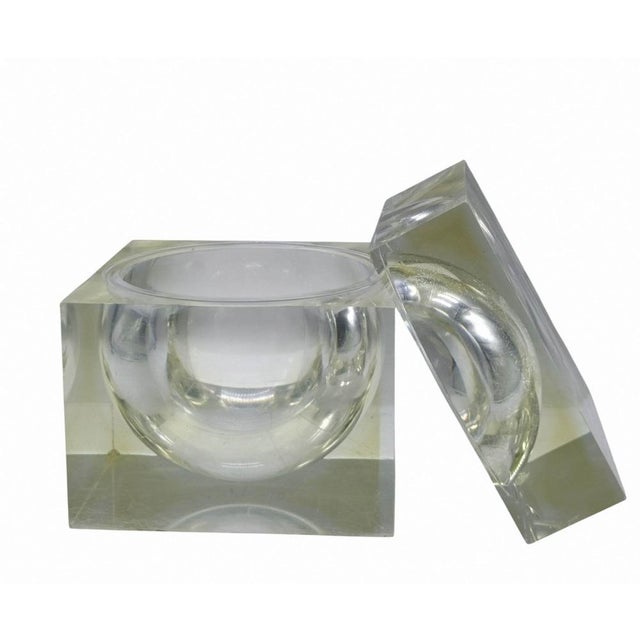Acrylic glass cube by Alessandro Albrizzi, an elegant decorative item from the 1970s. The cube opens up to reveal a...
