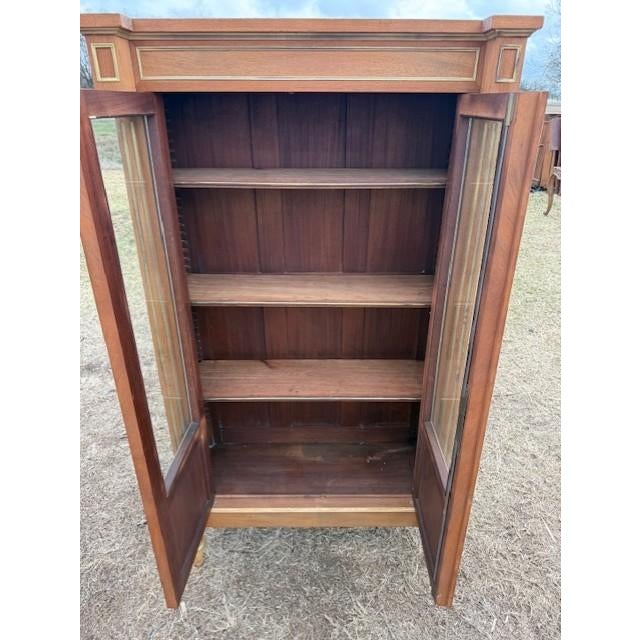 French 19th century louis XVI 2 door bookcase made of solid Mahogany. the wood was professionally sanded and bleached, the...