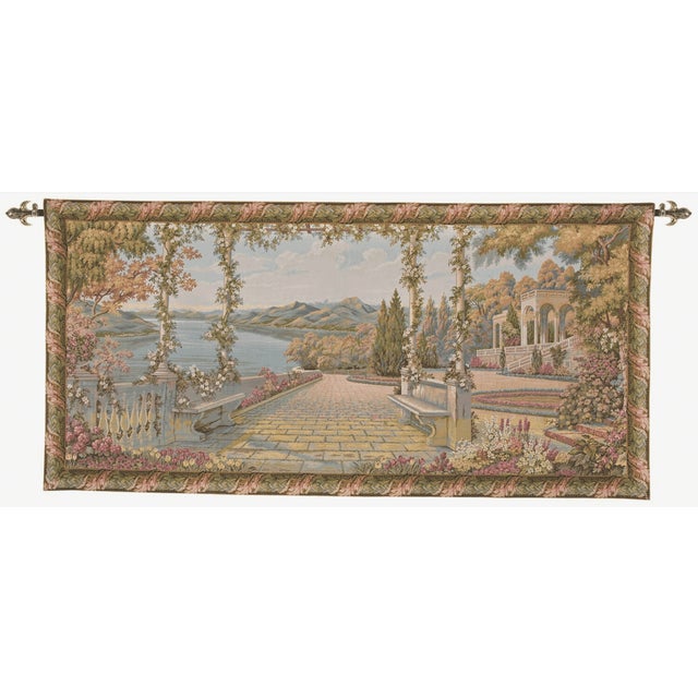 This tranquil scene is the view from the garden of a villa on the shores of Lake Como in Northern Italy. Situated in the...