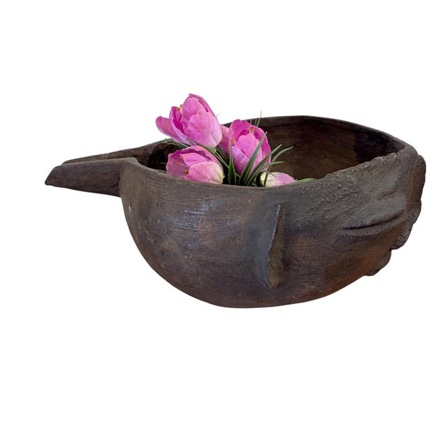 This vintage Kuba wooden cup is skillfully crafted in the form of a human head. Figural cups, such as this one, are prized...