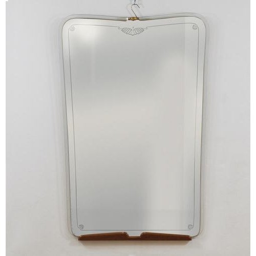 An exquisite and grandly scaled full-length wall mirror, designed by paolo buffa and finely crafted in italy during the...