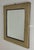 Rare mirror by Umberto Mascagni of the fifties. Wooden frame with vinyl leather frame. Good condition.