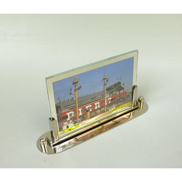An elegant picture frame, made in France, executed in the typically austere design language of Art Deco. The original...