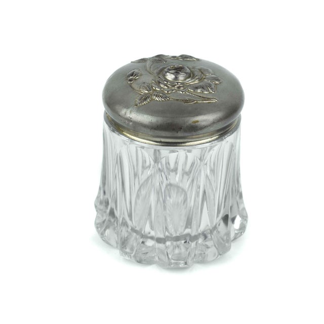 This handsome vintage humidor jar, dating from the 1920s to 1940s, features a heavy, pressed flint glass base with elegant...
