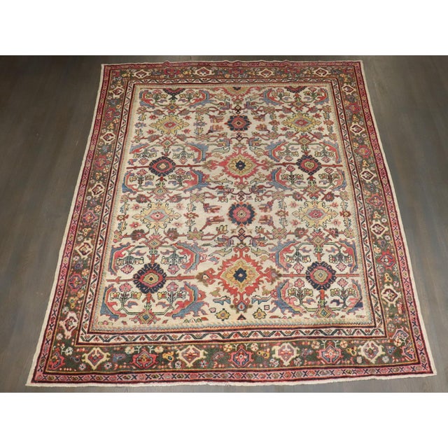 A room size ivory field Persian Mahal rug from the 2nd quarter of the 20th century