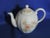 Wild Rose Teapot by Crowning Touch Collection This teapot has a soft wild rose pattern on 3 sides plus the lid. The lid...