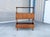 A rare and highly functional piece of American mid-century design, this multi-tier wall unit by Saginaw Furniture combines...