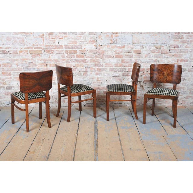 This set of four chairs originates from the 1920s and stylistically belongs to the elegant Art Deco period. Their...