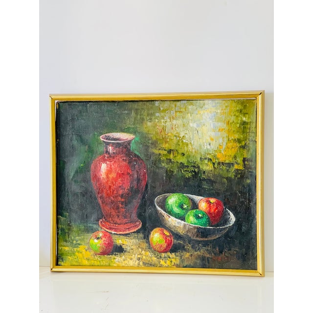 Post modern still life with red vase and apples oil on canvas painting. Gold tone frame.
