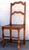 French fruitwood wavy ladderback chair. Pegged construction. 18th century
