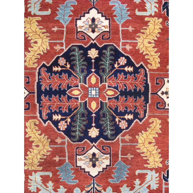 The Pasargad Home Serapi Collection offers traditional rugs crafted with exceptional attention to detail. Each rug is...