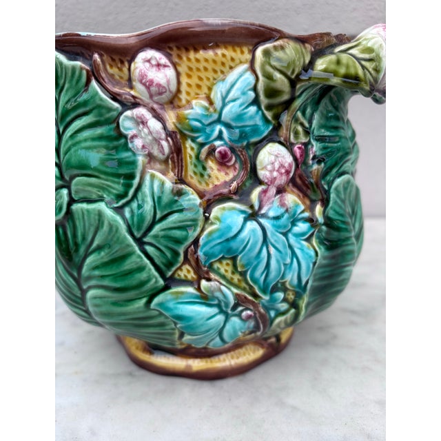 Pair of Majolica Flowers & Leaves signed Luneville Cache Pots Circa 1890, H / 7 inches , D / 9 inches by 7 inches.