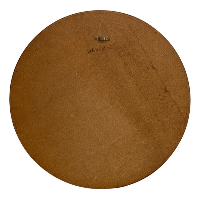 Beautiful Swedish, 1960s, mirror in teak, handmade wooden construction with a black inner rim. Designed by Uno & Östen...