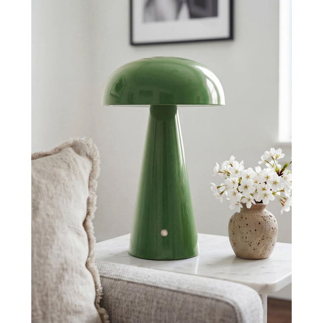 Illuminate your space with the chic and portable Umbra accent table lamp, a beacon of minimalist modern style. Standing at...
