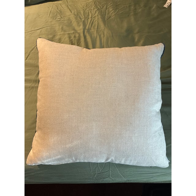 Decorative throw pillow featuring Maresca Textiles’ Pisa fabric in blue, coral red and cream, with a down and feather...