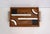 Modernist Art Deco serving tray: rectangular shape, wooden frame (painted in a burl wood style), with elegant square-...