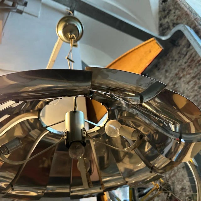 1960s Mid-Century Modern Italian Steel Pendant Lamp Attributed to Reggiani Bring iconic Italian design into your space...