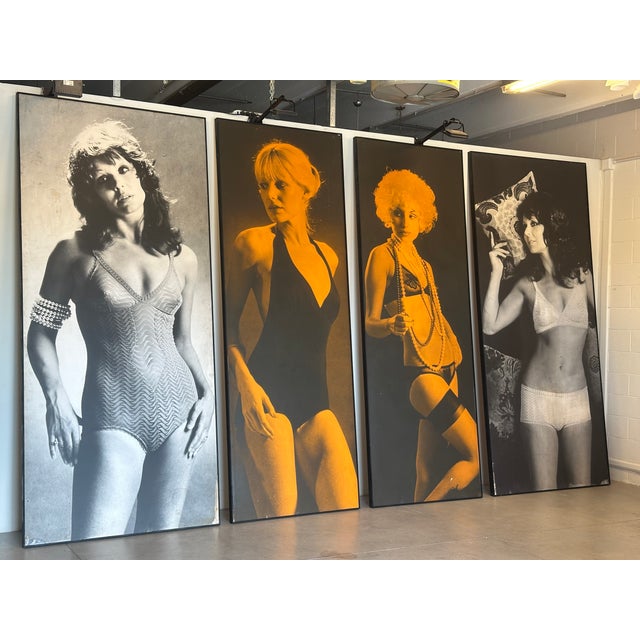 Set of 4 giant photographs from the 70s, depicting 4 models in underwear, two in black and white (296h.x132x5 cm.) and two...