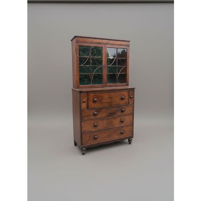 Beautiful Georgian mahogany inlaid secrétaire bookcase, a classic 18th-century British furniture design. It combines a...