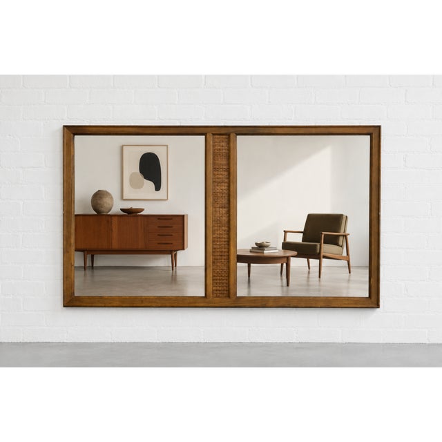Large Mid century Modern Mirror Walnut Mirror with center rattan braided detailing, circa 1960's. Lovely vintage condition...