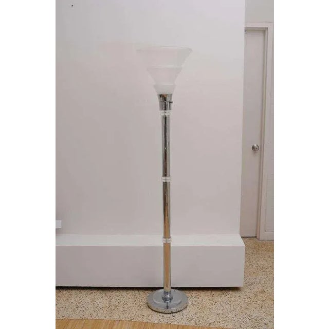 This polished chrome and frosted glass Art Deco style floor lamp embodies the style and movement of the period through the...