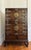 Diminutive early 19th century Korean Jang cabinet with brass detail features upper and lower cabinet and two small...