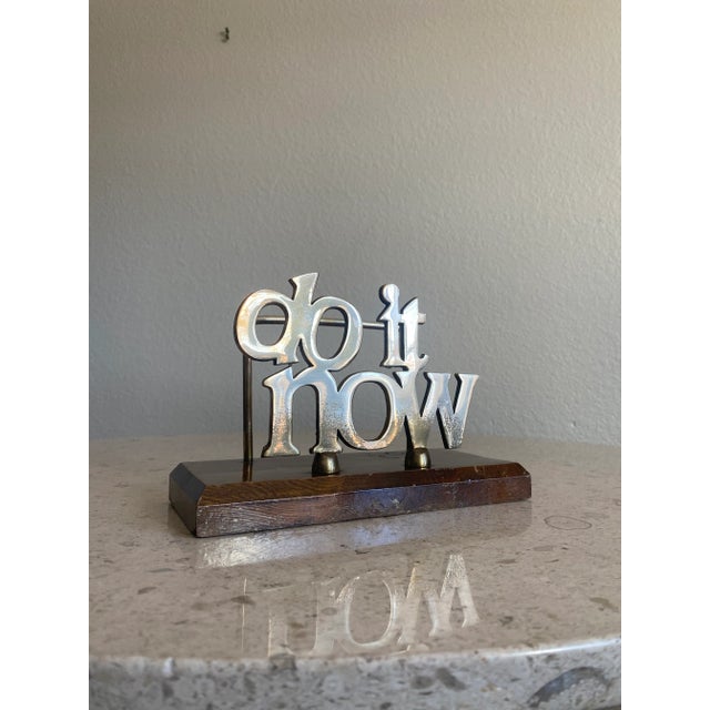 Midcentury Modern, late 1970s “Do It Now” brass letter holder. Nice, whimsical piece for anyone with a sense of whimsy....