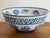 Large blue and white ceramic centerpiece bowl with a coral and shell motifs inside and out. Classic coastal styling and...