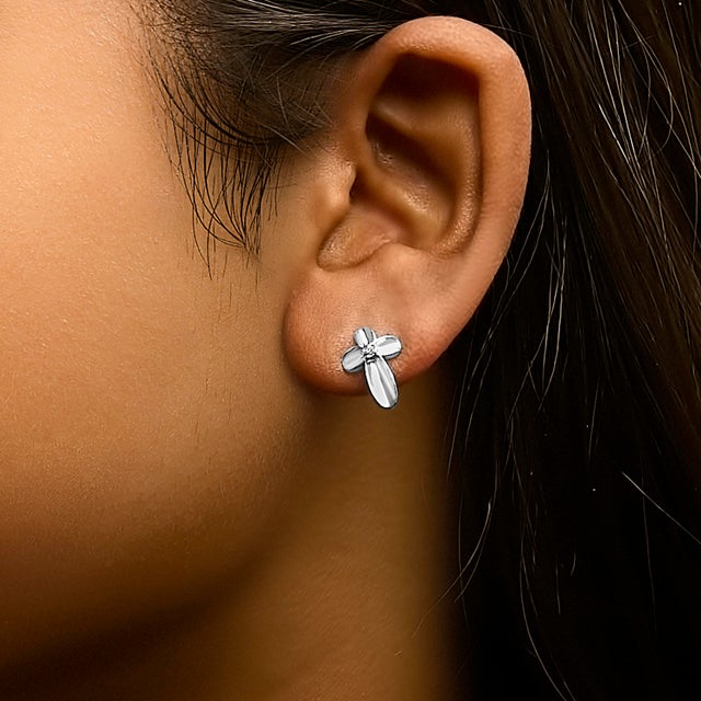 Early 21st Century .925 Sterling Silver Prong Set Diamond Accent Floral Cross Stud Earring (I-J Color, I1-I2 Clarity) For Sale - Image 5 of 6