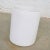 Iconic vintage mid-century modern monumental white cylindrical pot by Architectural Pottery of California. Mark is on the...
