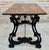 19th century Baroque Spanish side table with marquetry top 19th century Spanish trestle table in walnut. This piece has a...