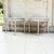 A pair of 19th century French Directoire demi lune consoles in solid oak, finished in a soft whitewash that lets the...