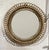 An elegant circular wall mirror, attributed to mid-century Italian design (inspired by the designs of Franco Albini and...
