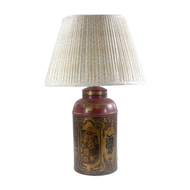 Vintage Chinoiserie Tole and Gilt Tea Tin Lamp. Vintage Chinoiserie red tole tea tin with gilt decoration inspired by...