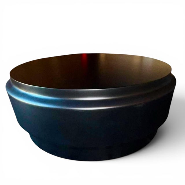 This beautiful and versatile table from Holly Hunt was designed to move seamlessly between indoor and outdoor settings....