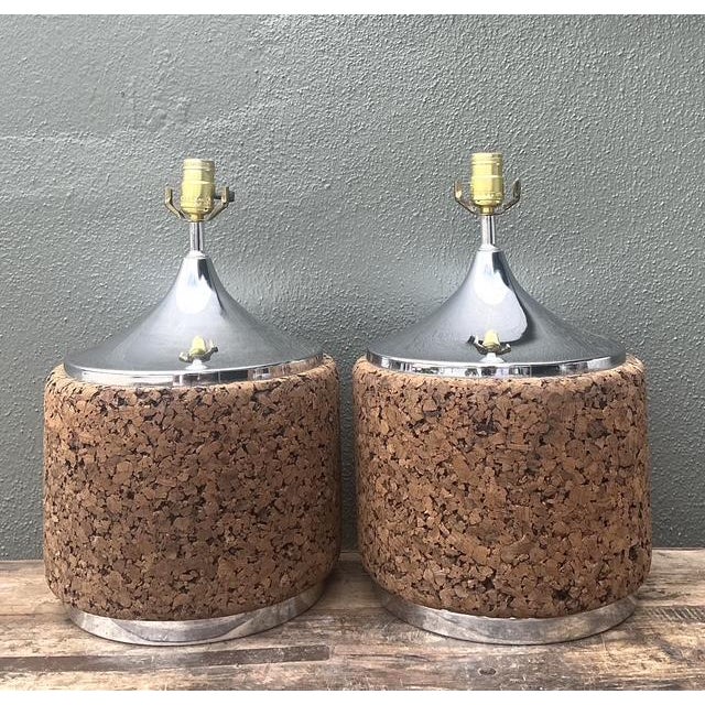 Elevate your interior with this striking pair of vintage 1970s table lamps, showcasing a bold juxtaposition of organic...