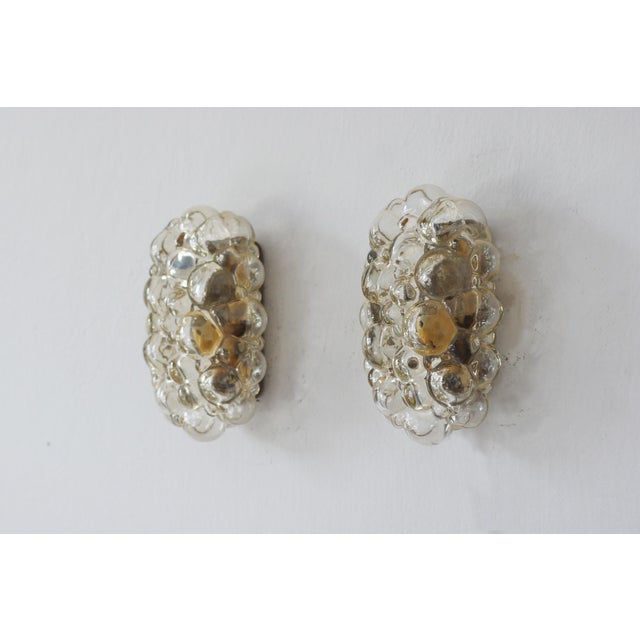 This pair of striking “Bubble” wall sconces, designed by Helena Tynell, is one of the most recognizable examples of...