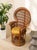 A wonderfully dramatic 1970s peacock chair crafted in richly toned woven wicker and rattan. Its oversized fan-shaped back...