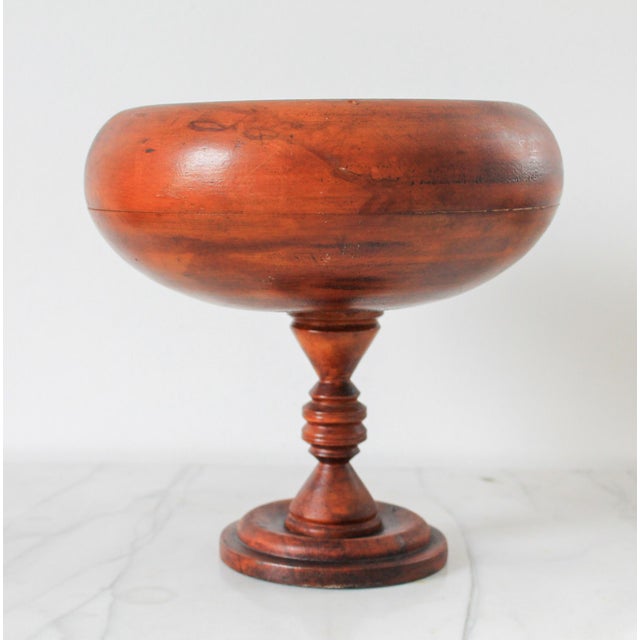 Vintage turned wood pedestal bowl. No makers mark. Some minor age wear.