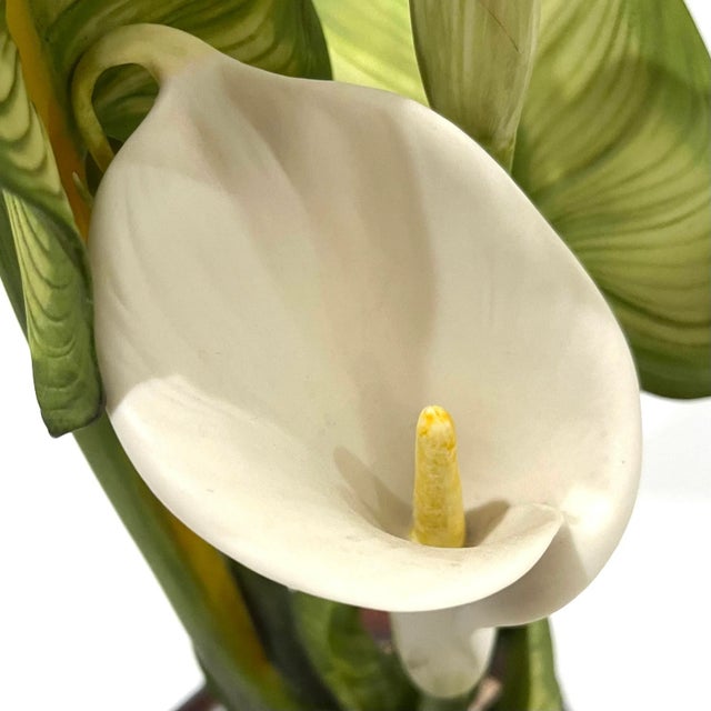 This finely detailed sculpture of a calla lily plant was produced by Cybis sometime between 1968 and 1974. Beautiful hand...