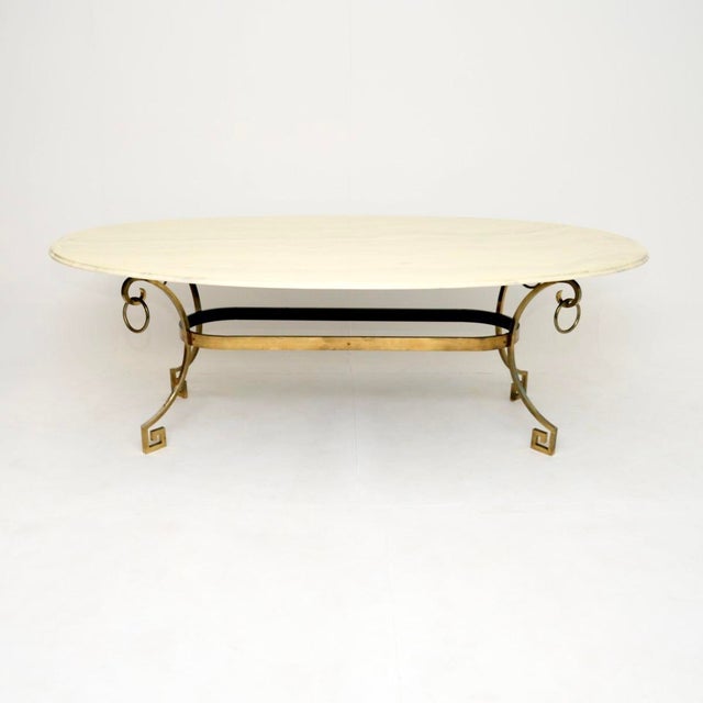 A stunning vintage Italian brass dining table. This was made in Italy, it dates from around the 1950’s. The quality is...